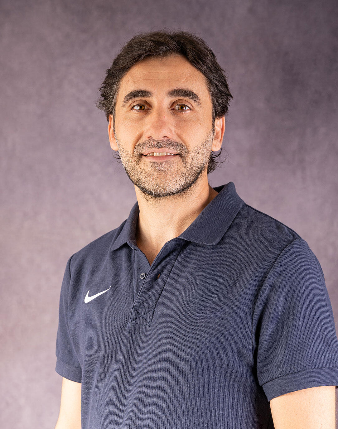 Retrato profesional de Pedro Quijada, coach de mentalidad deportiva élite y experto en rendimiento mental, representando coaching para deportistas y entrenadores.
